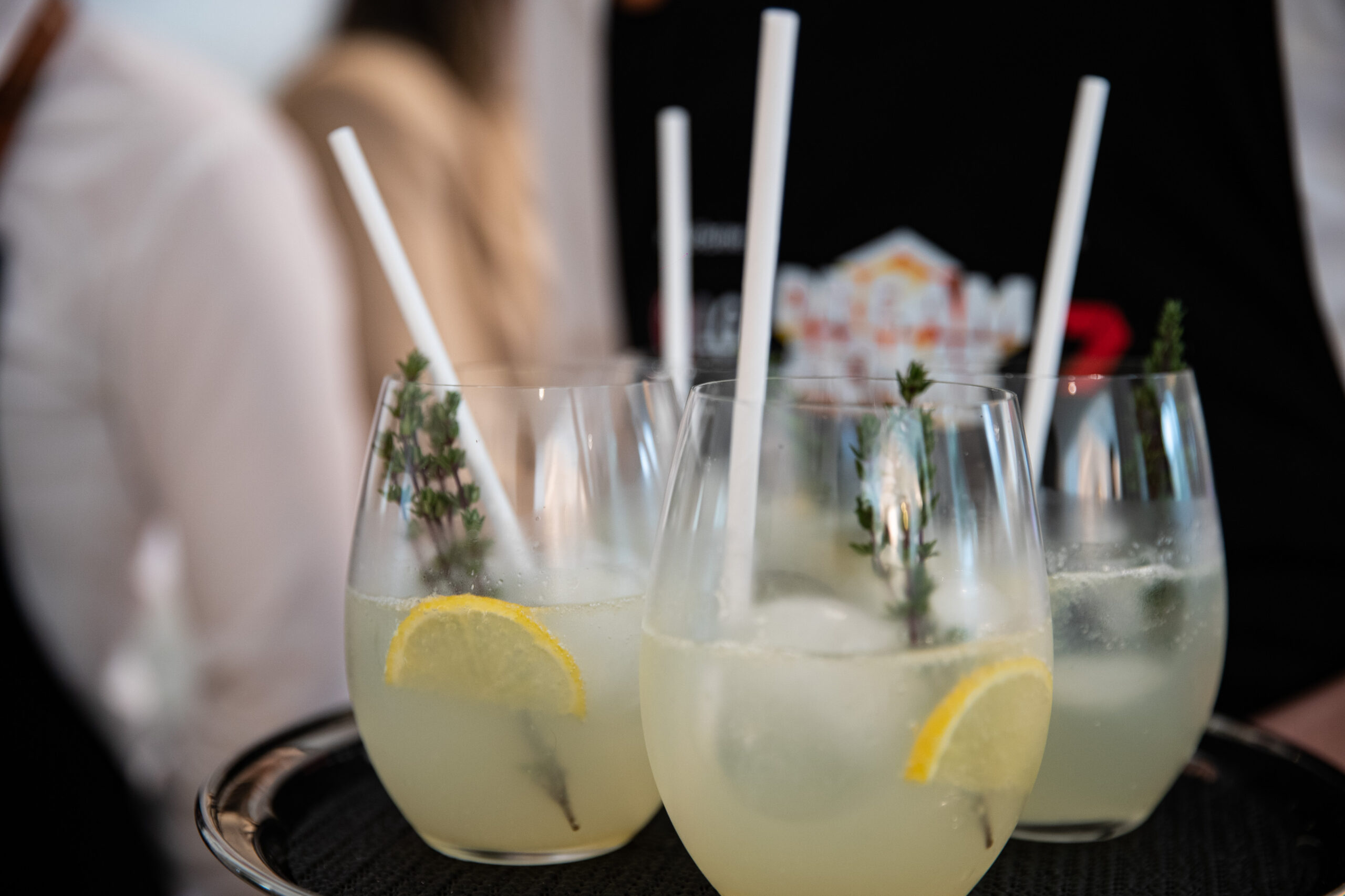 tray of lemon and thyme cocktails for a private at home party