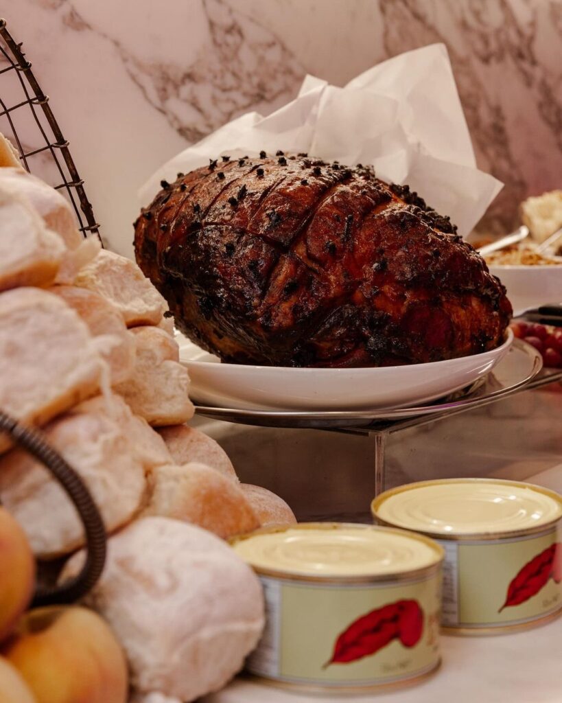 Glazed Christmas Ham with bread rolls and butter, delivered by The Blonde Butler's Christmas catering menu