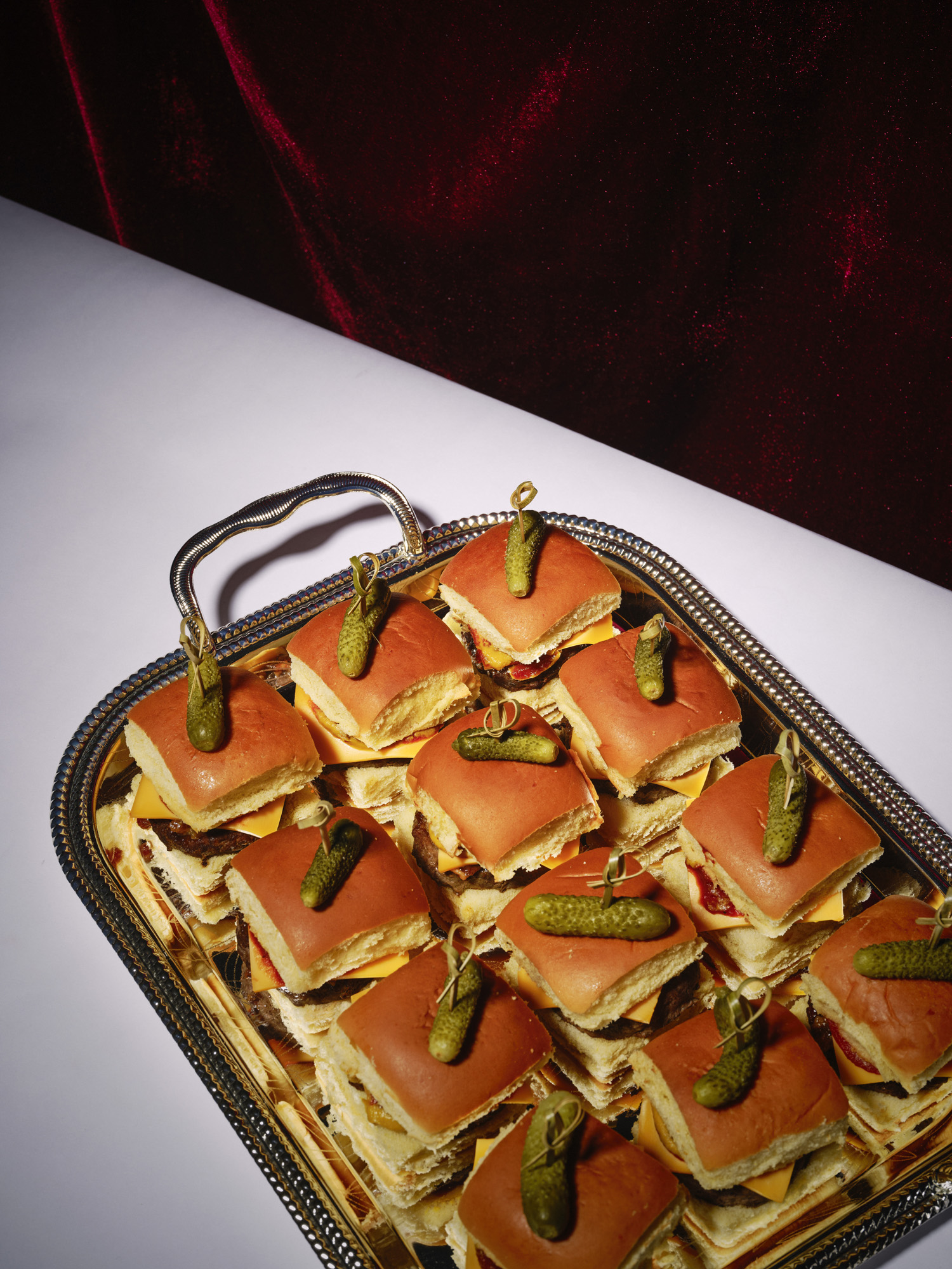 Angus beef slider with American cheese & pickle