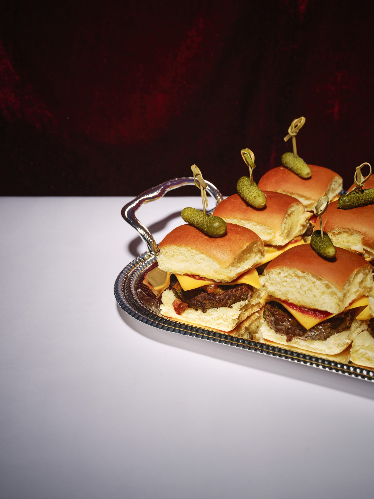 Angus beef slider with American cheese & pickle