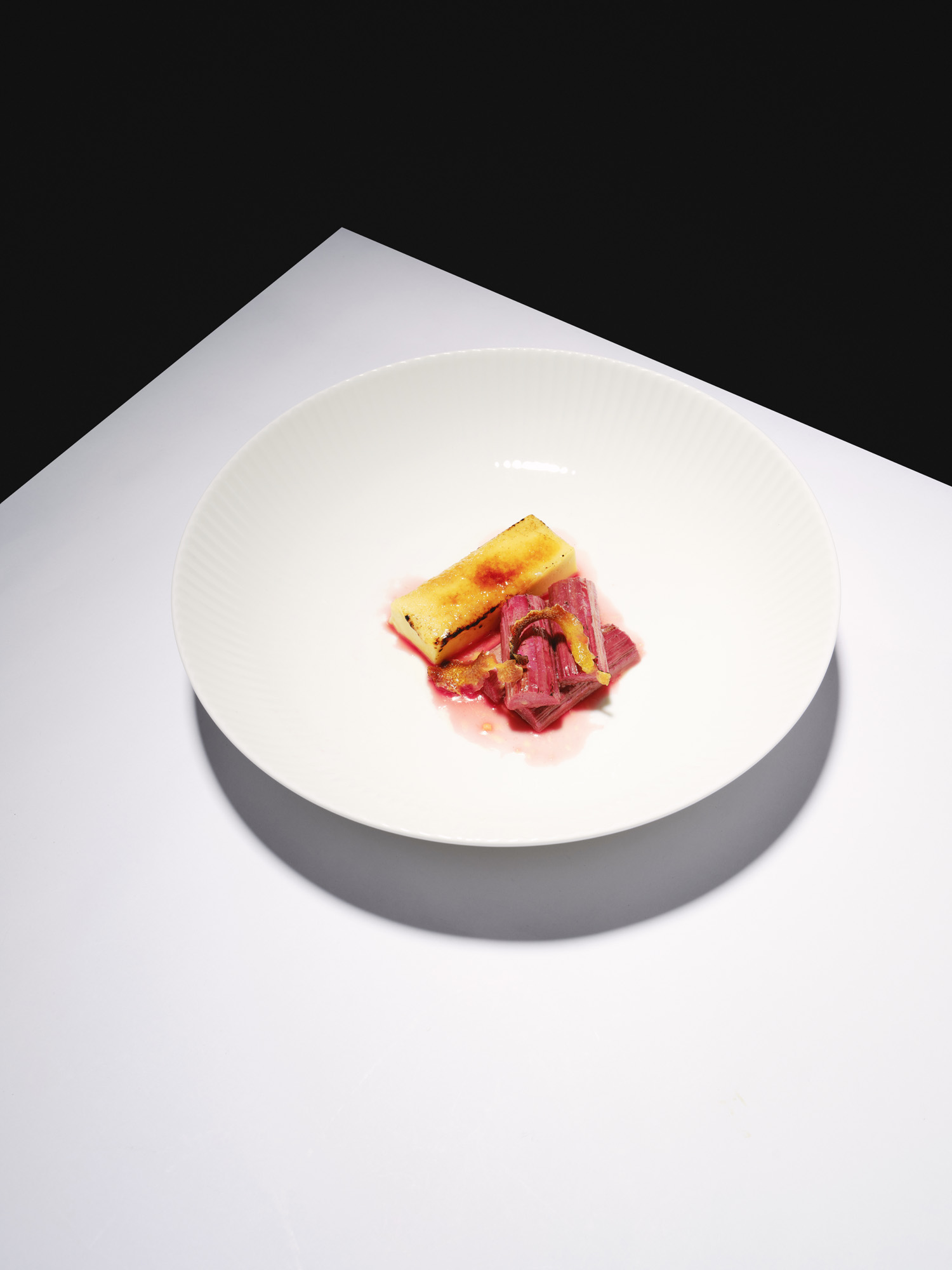 Plated rhubarb dessert by The Blonde Butler.