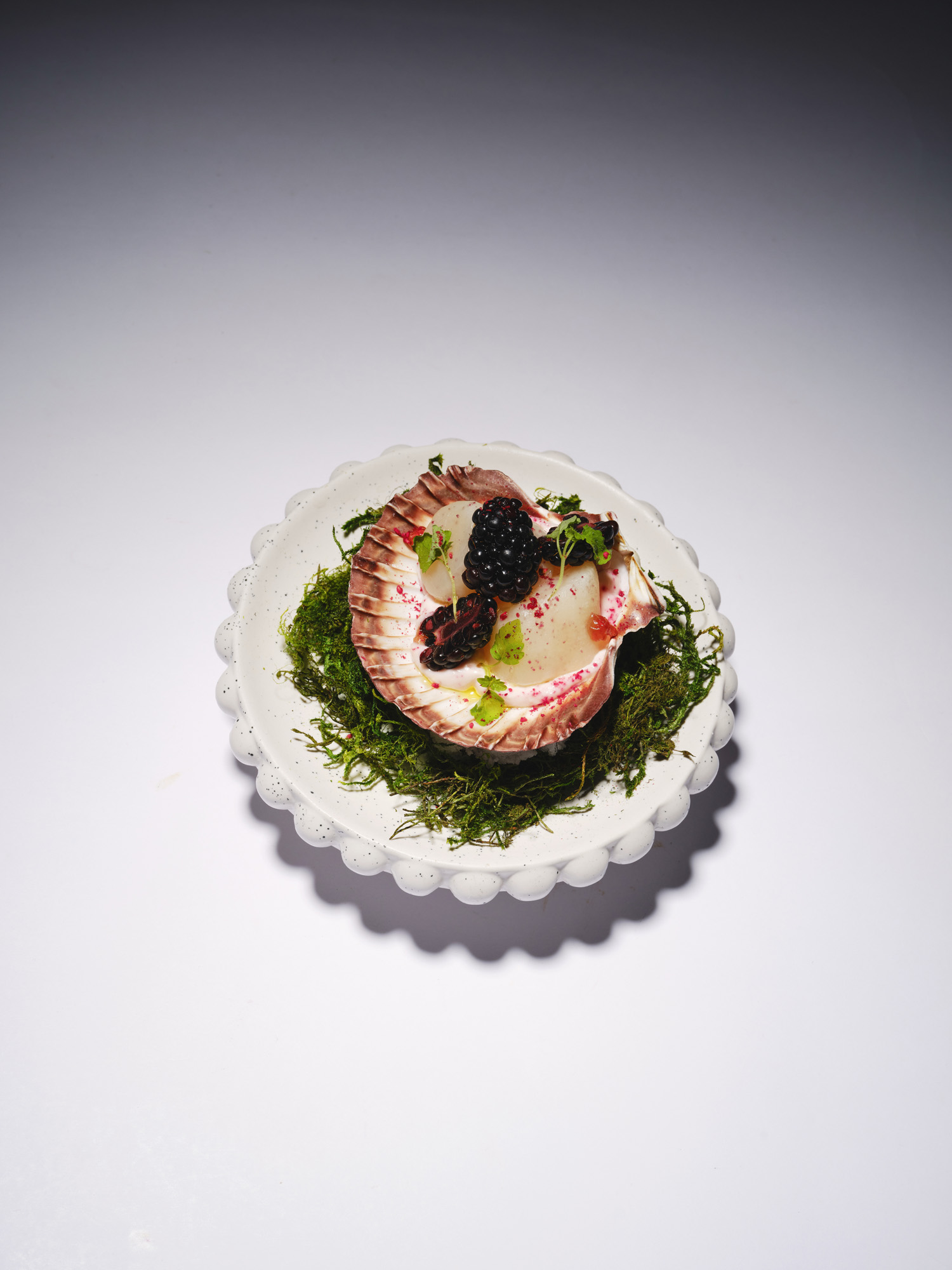 Scallop ceviche, taramasalata, blackberry & avruga caviar entree.