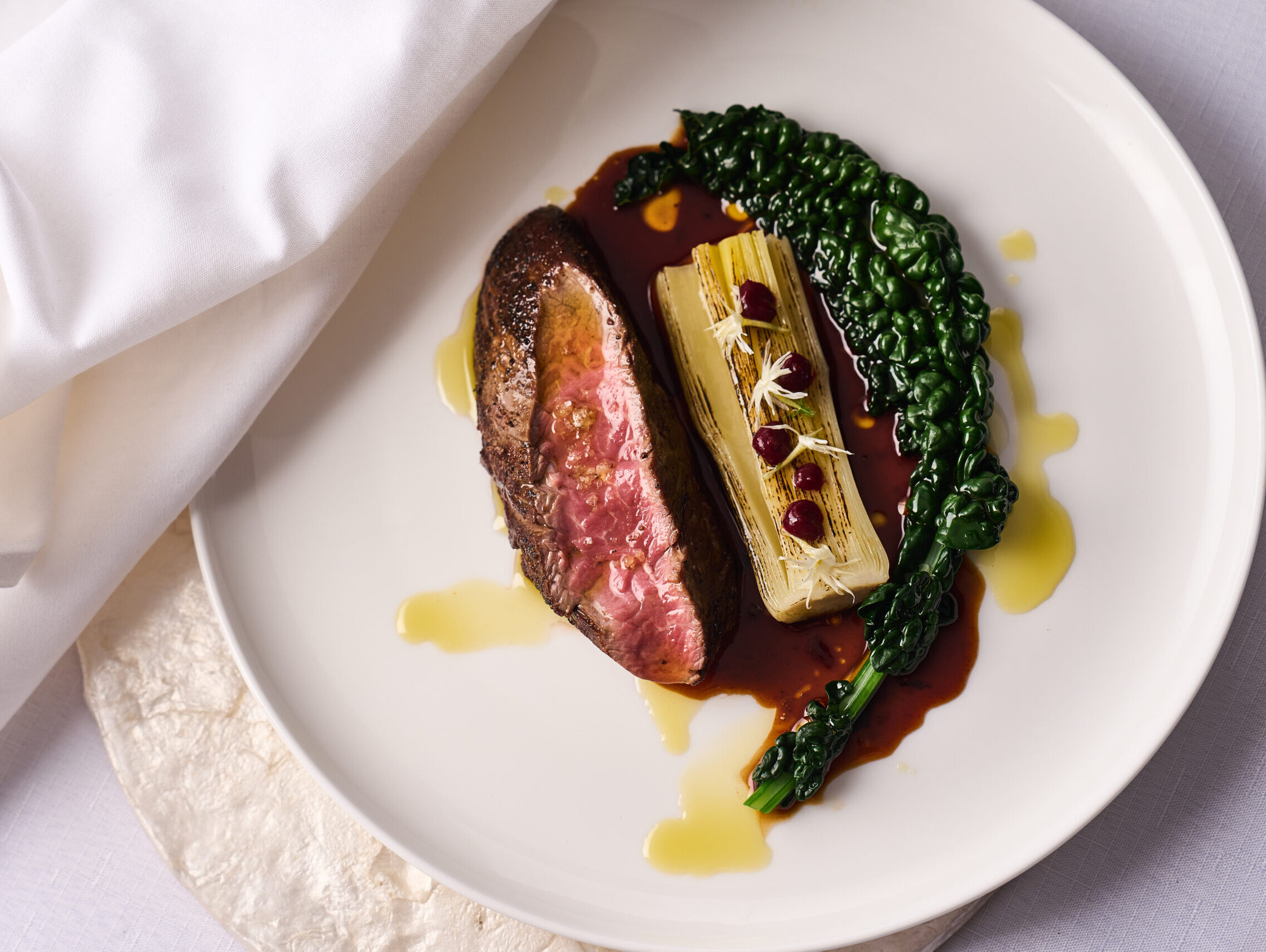 Plated beef dish for sit down events by The Blonde Butler